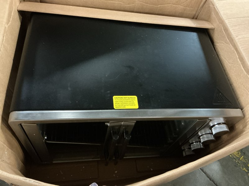 Condition photo showing As Is for Elite Gourmet ETO-4510M French Door 47.5Qt, 18-Slice Convection Oven 4-Control Knobs, Bake Broil Toast Rotisserie Keep Warm, Includes 2 x 12" Pizza Racks, Stainless Steel 18-Slice, 45L