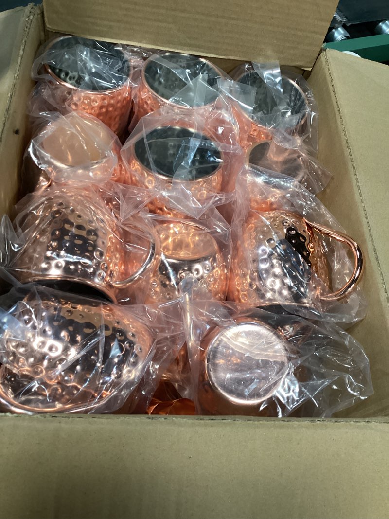 Condition photo showing Good Condition for Moscow Mule Copper Mugs 19oz Moscow Mule Mugs Set of 24 Bulk Large Copper Hammered Plating Cups with Round Handle,1pcs 0.5oz Double Jigger, 24pcs Straws for Cold Chilled Drinks Cocktails Gift 24 Piece Set
