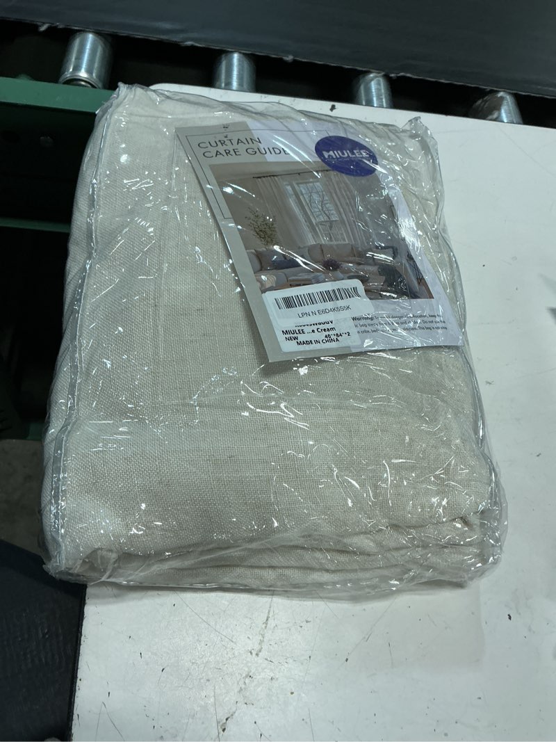 Condition photo showing New/Like New for miulee pinch pleated thick linen curtains 84 inches long 2 panels for living room bedroom, linen textured memory trained drapes pleat back tab light filtering natural window curtains with hooks&rings 40"w x 84"l (pack of 2) natural