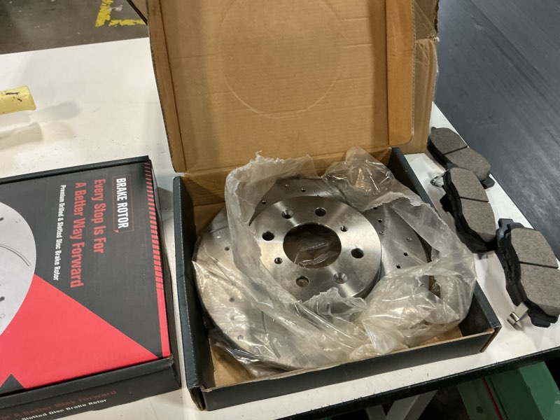 Condition photo showing Good Condition for r1 concepts drilled and slotted carbon coated disc brake rotor set with optimum oe pads wbun2-42066