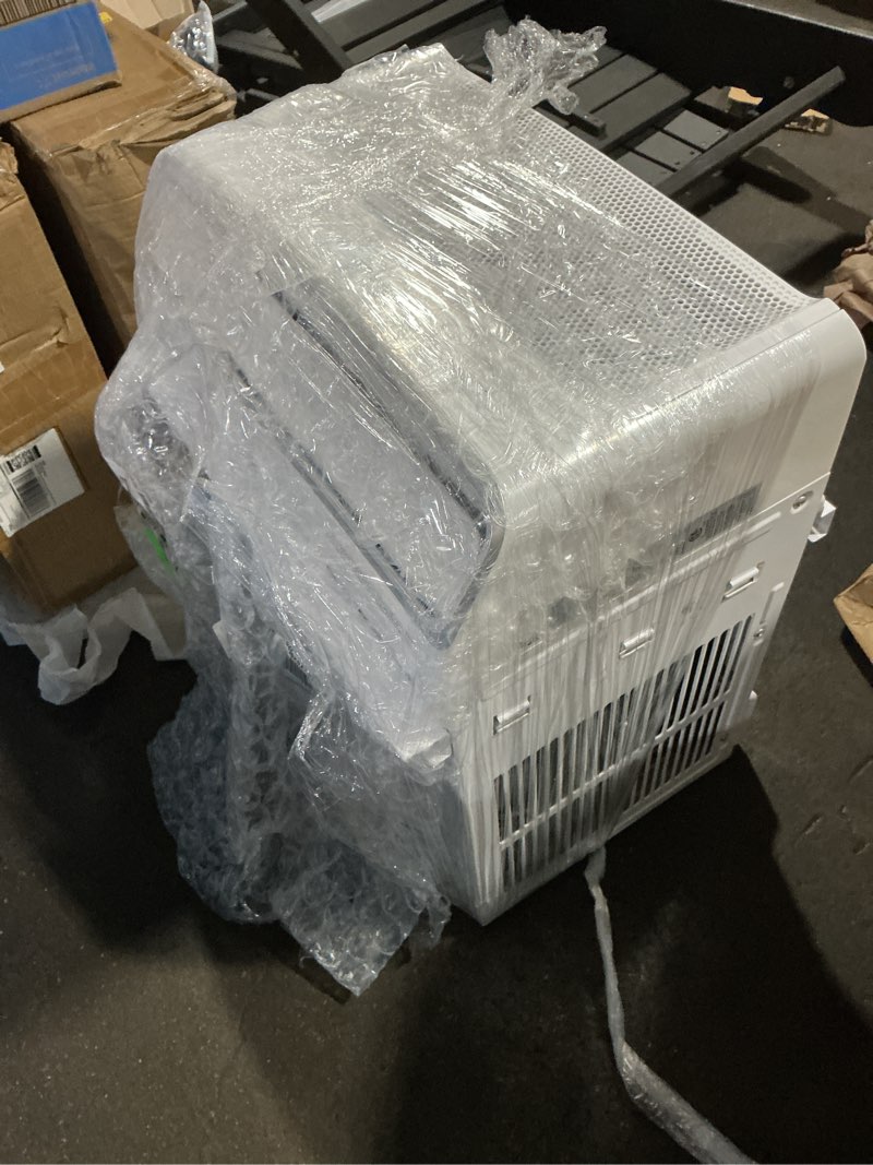 Condition photo showing Good Condition for frigidaire 5,000 btu window-mounted air conditioner, cools up to 150 sq. ft., quiet operation, effortless temperature control, 2 fan speeds, auto restart, white 5,000 btu mechanical controls
