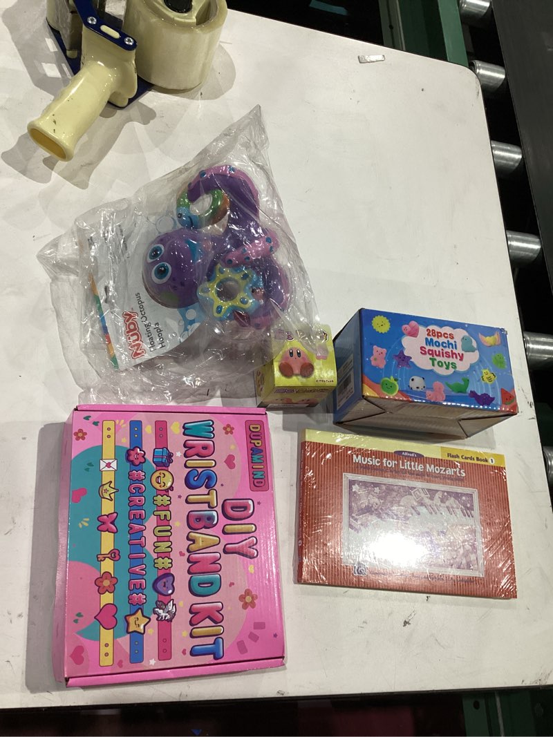 Condition photo showing Good Condition for assorted lot of toys and games 