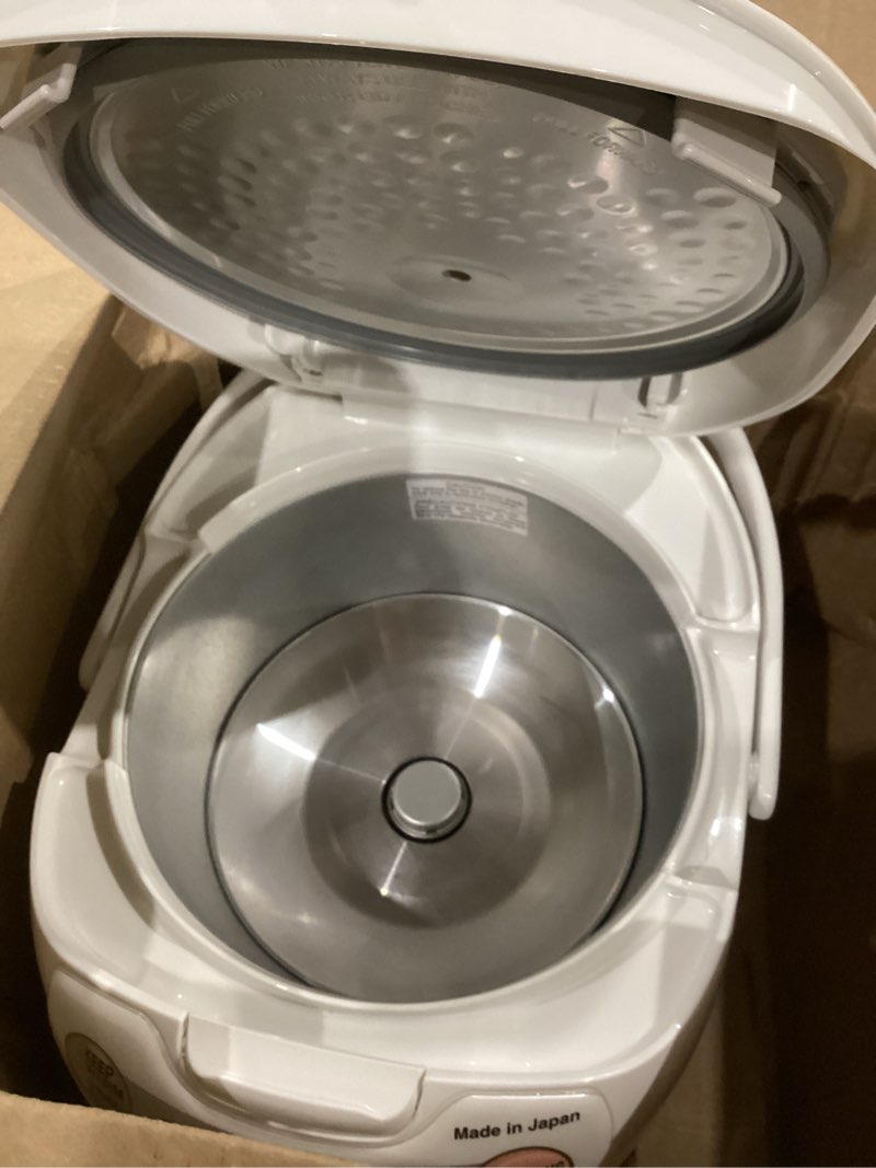 Condition photo showing Good Condition for zojirushi ns-zcc10 5-1/2-cup neuro fuzzy rice cooker and warmer, premium white 5.5-cup uncooked rice