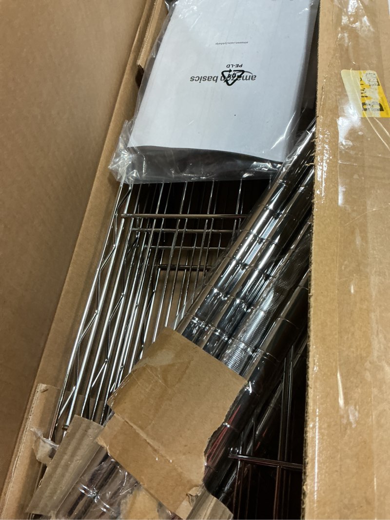 Condition photo showing Good Condition for amazon basics 4-shelf adjustable storage shelving unit for garage, steel wire rack, 200 pound loading capacity per shelf, 13.4"d x 23.2"w x 48"h, chrome 4-shelf narrow chrome
