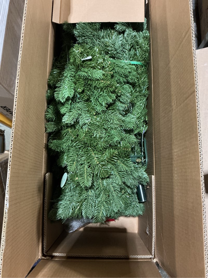 Condition photo showing As Is for national tree company pre-lit feel real®artificial christmas tree  green  downswept douglas® fir  clear lights  includes stand  6.5 feet