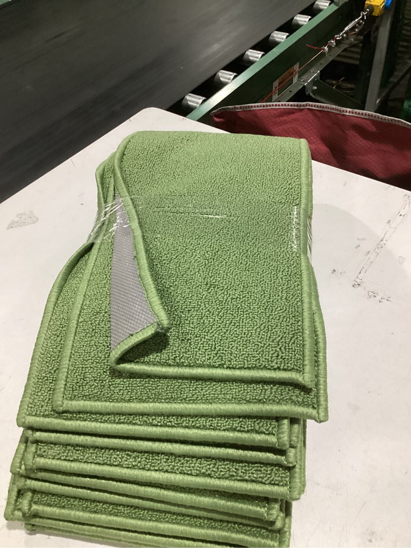 Condition photo showing Good Condition for ottomanson non-slip stair treads for wooden steps – set of 7 low-profile stair mats with rubber backing, indoor staircase protection for kids & pets – dirt-trapping step covers, 8\" x 30\", green green 8\" x 2'6\" (7 pack)similar to