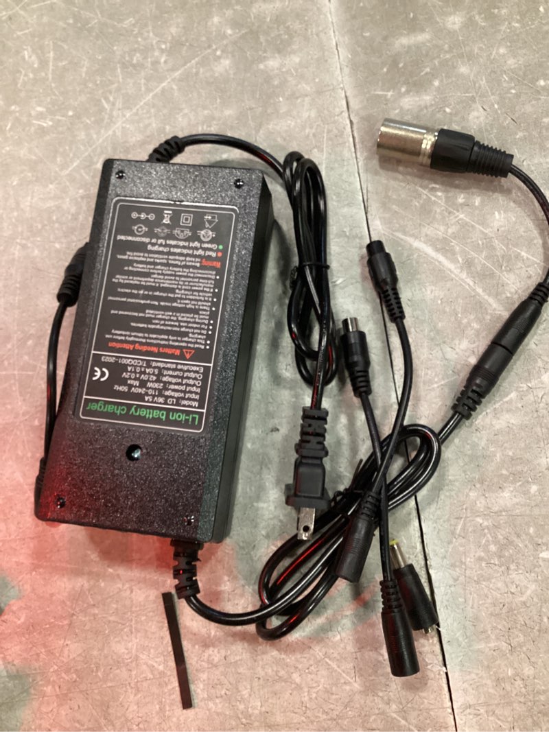 Condition photo showing As Is for 42v 5a charger charging speed is 300% fast than 1.5a and 150% faster than 2a,6 plug suitable for various lithium batteries, such as lawn mower and wheelchair lithium batteries, etc. (5a-6 plugs)
