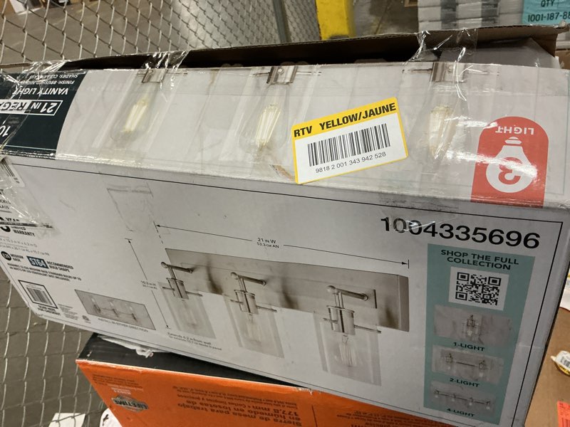 Condition photo showing As Is for hampton bay regan 21 in. 3-light brushed nickel bathroom vanity light with clear glass shades