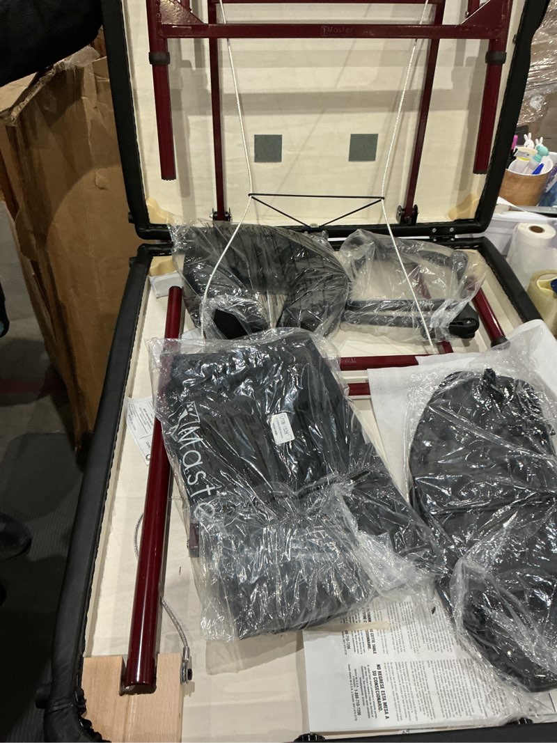 Condition photo showing As Is for master massage newport portable massage table package with denser 2.5" cushion, walnut stained hardwood, steel support cables, pillows & accessories, black, 30" standard black