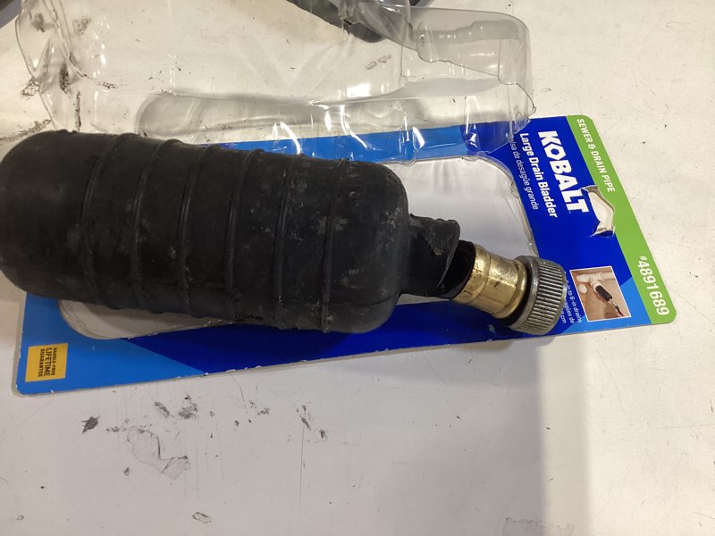 Condition photo showing As Is for kobalt large drain rubber bladder