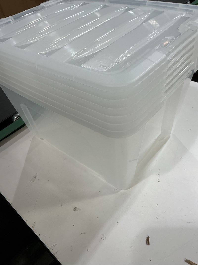 Condition photo showing As Is for iris usa 54 qt stackable plastic storage bins with lids, 6 pack - bpa-free, made in usa - see-through organizing solution, latches, durable nestable containers, secure pull handle - clear clear 54 qt 6 pack