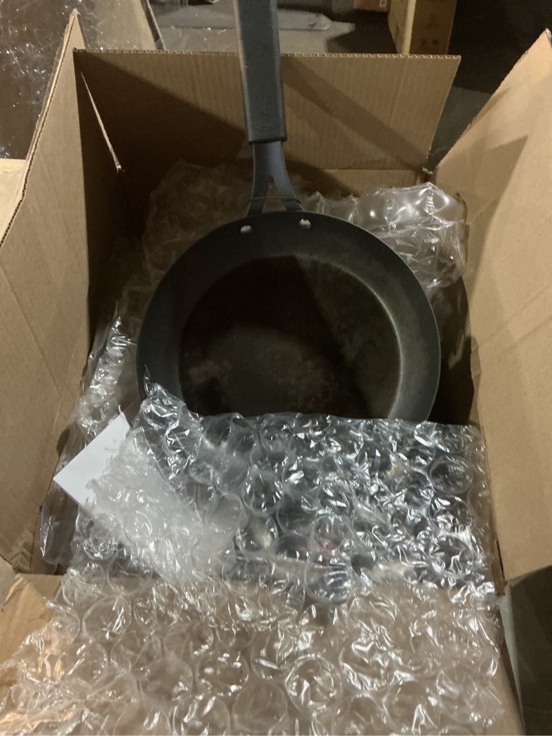 Condition photo showing As Is for oxo obsidian pre-seasoned carbon steel, 10" frying pan skillet with removable silicone handle holder, induction, oven safe, black