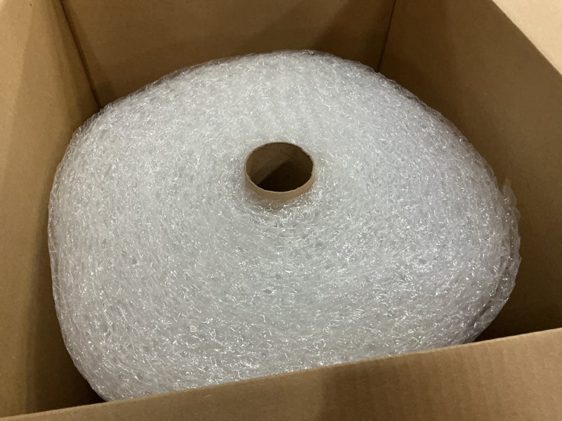 Condition photo showing Good Condition for Amazon Basics Bubble Cushioning Wrap for Moving, Packing, Shipping and Storage, Heavy Duty Protection for Fragile Items, 12-inch x 100-foot Long Roll, Large 5/16", Clear Clear 12 inch x 100 ft