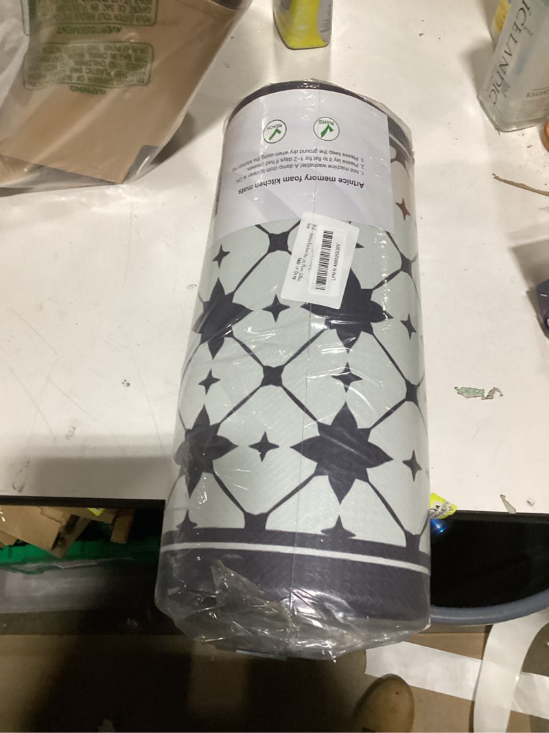 Condition photo showing New/Like New for Artnice Kitchen Mat 2 PCS, Black White Plaid Cushioned Anti-Fatigue Kitchen Rug, Waterproof Non-Slip Kitchen Mats and Rugs, Heavy Duty Ergonomic Comfort Rug for Kitchen, Floor, Office, Sink 17.3"x30"+17.3"x47.2" Black and White