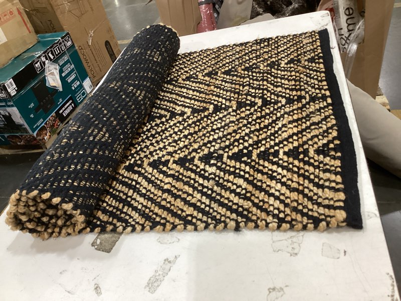 Condition photo showing As Is for the house doctor monta rug black chevron pattern, runner rug