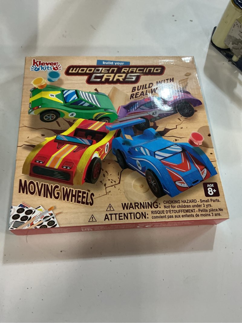 Condition photo showing New/Like New for Klever Kits 4 DIY Wooden Race Cars-Build & Paint Your Own Wood Craft Kit, 4 Race Cars Toy, Easy to Assemble Arts Crafts Kit, Birthday Party Presents for Kids Boys and Girls