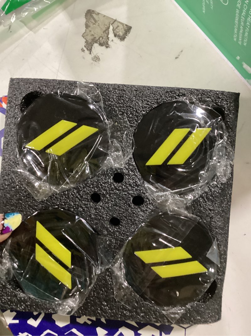 Condition photo showing New/Like New for (set of 4) 63mm=2.5 inches // slash wheel center cap covers hubcap emblem badge trim for dodge charger challenger durango hornet dart r/t srt magnum nitro journey caliber avenger 2.5"(63mm) yellow // on gloss black cap