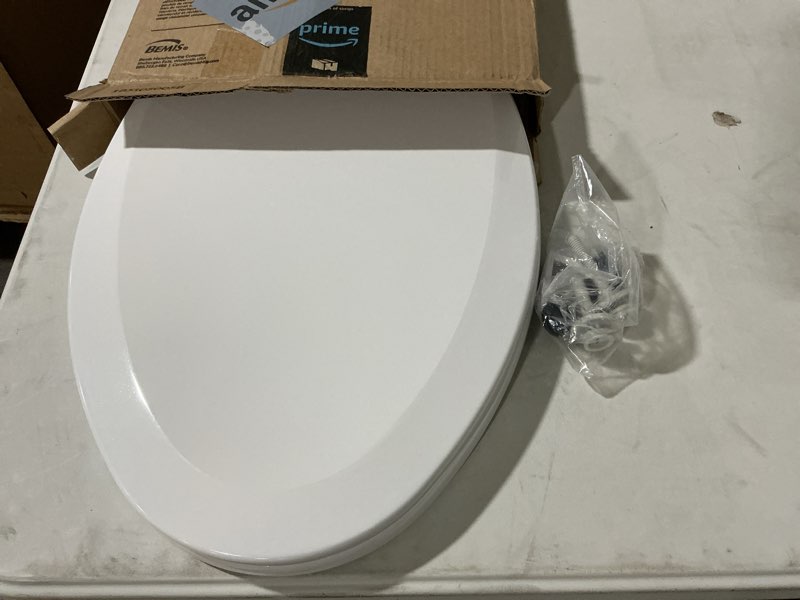 Condition photo showing As Is for bemis 1500ec 390 lift-off wood elongated toilet seat, cotton white (pack of 1)