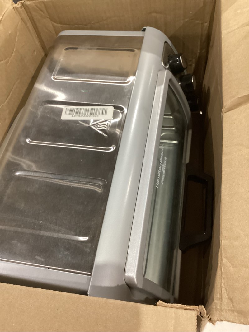 Condition photo showing Good Condition for hamilton beach 6 slice countertop toaster oven with easy reach roll-top door, bake, broil & toast functions, auto shutoff, silver (31127d)
