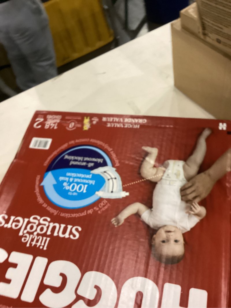 Condition photo showing New/Like New for Huggies Size 2 Diapers, Little Snugglers Baby Diapers, Size 2 (12-18 lbs), 148 Count, Packaging May Vary Size 2 148