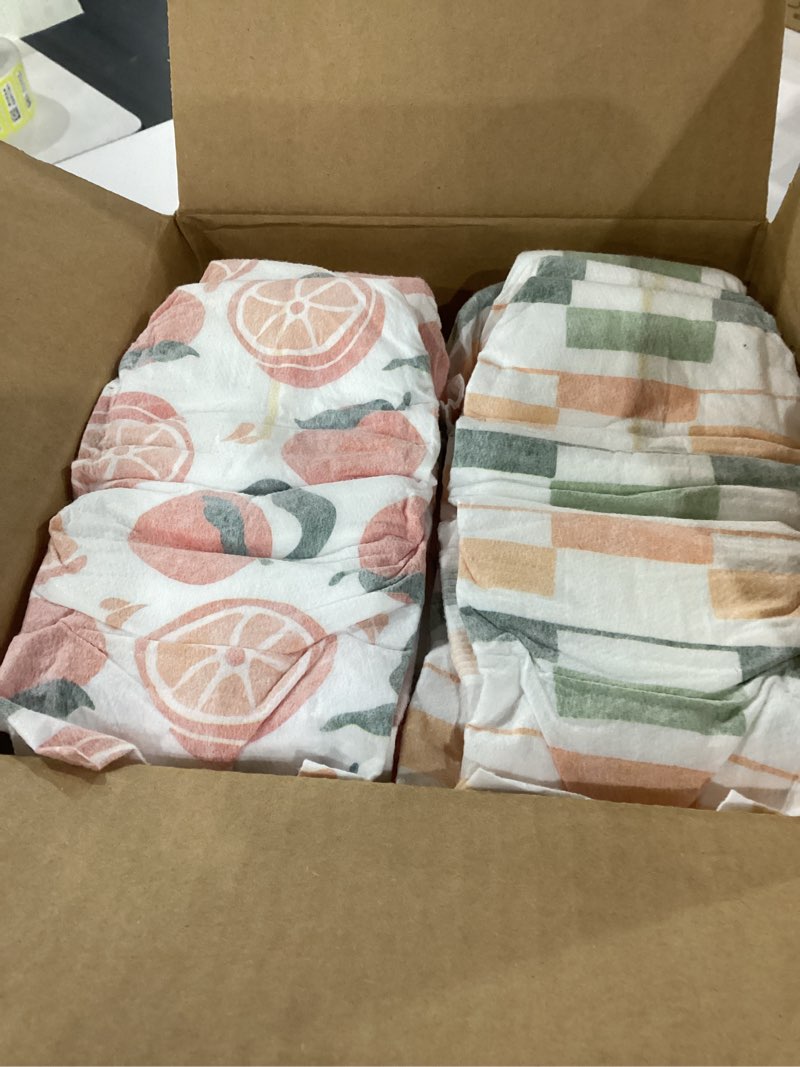 Condition photo showing As Is for hello bello premium diapers size 5, main squeeze & zesties for the resties designs, 48ct club box size 5 main squeeze & zesties for the resties