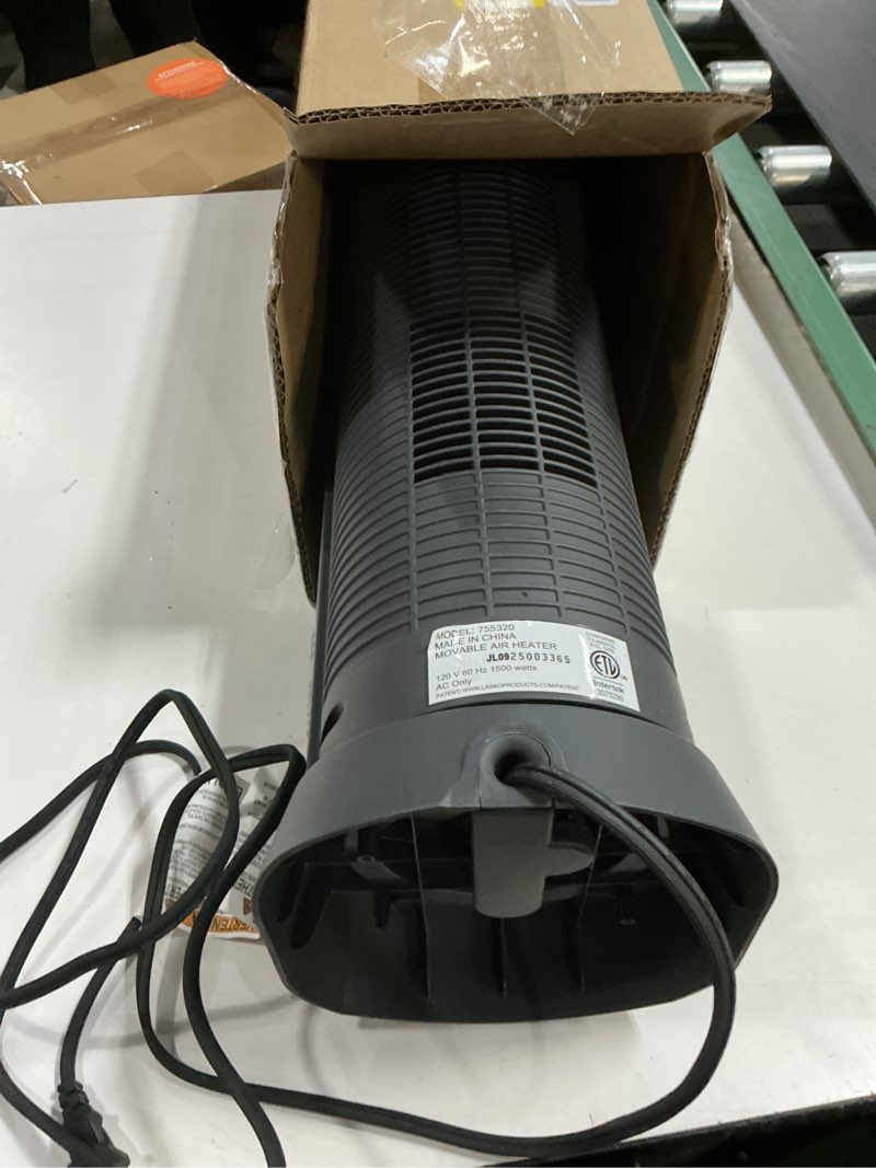 Condition photo showing As Is for lasko oscillating digital ceramic tower heater for home with adjustable thermostat, timer and remote control, 23 inches, 1500w, silver, 755320 silver heater