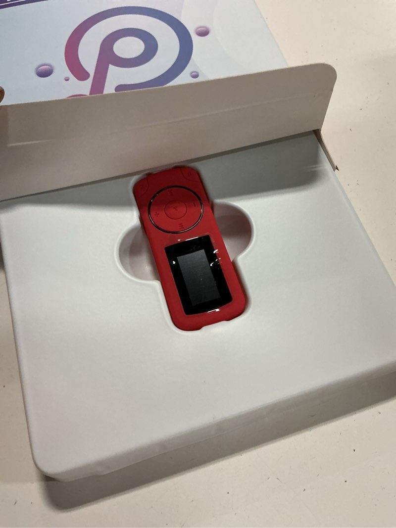 Condition photo showing Good Condition for 64gb sport clip on mp3 player with bluetooth- superlight mini mp3 player with fm radio,recorder, microsd support, shuffle playback for running, cycling, hiking, climbing and yoga coral red