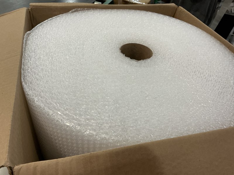 Condition photo showing New/Like New for Amazon Basics Bubble Wrap for Moving, Packing, Shipping and Storage, Perforated Protective Cushioning for Fragile Items, 12-inch x 175-ft Long Roll, Small 3/16", Clear Clear 12 inch x 175 ft