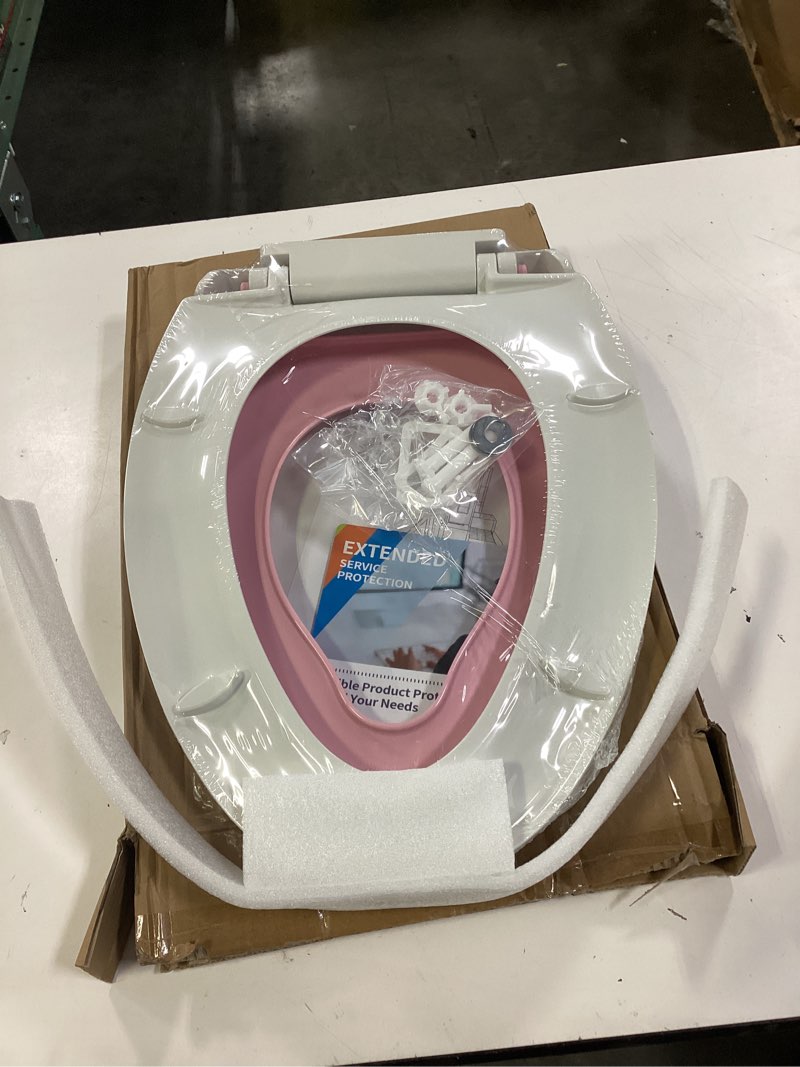 Condition photo showing New/Like New for 17 inch round toilet seat with built-in toddler potty trainer | no-wiggle design & soft-close pink lid | easy installation for child & adult use | durable & stable for longtime usage round seat with toddler seat white and pink