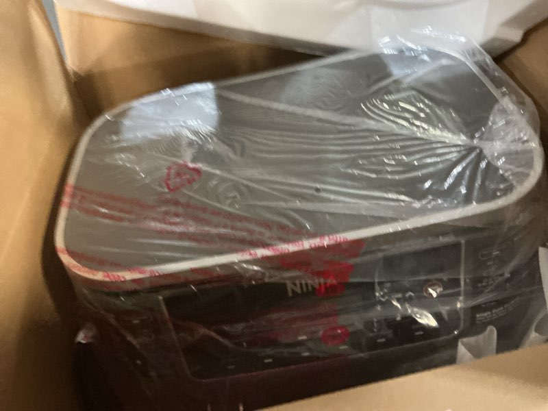 Condition photo showing New/Like New for Ninja DZ201 Foodi 8 Quart 6-in-1 DualZone 2-Basket Air Fryer with 2 Independent Frying Baskets, Match Cook & Smart Finish to Roast, Broil, Dehydrate & More for Quick, Easy Meals, Grey