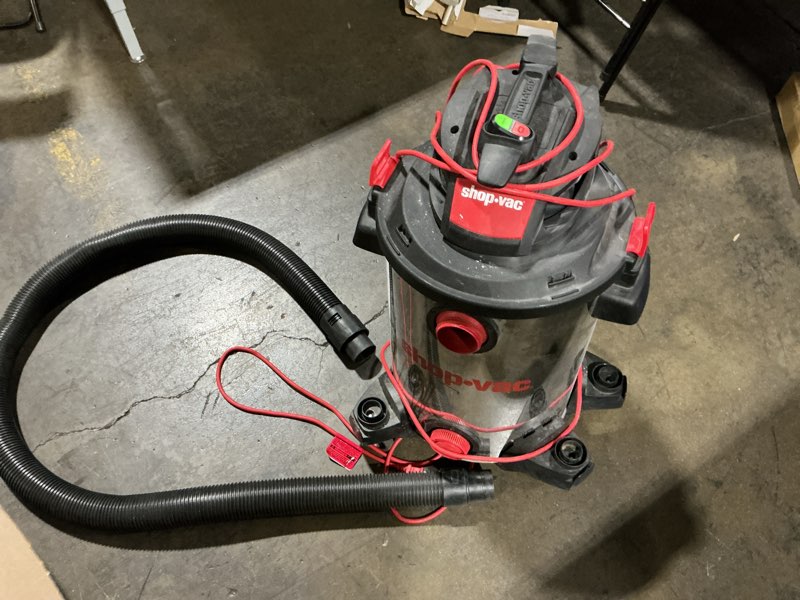 Condition photo showing As Is for shop-vac 5761311 12-gallon wet/dry shop vacuum, 6 peak hp, 1.5 inch diameter x 7 foot hose, 20 foot cord, ideal for home, garage, and workshop cleaning (missing wheel, no accessories)