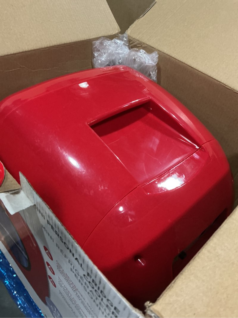 Condition photo showing As Is for Frigidaire Retro Mini Personal Fridge Cooler, Holds 9L or 12 Cans, Portable for Car, Office, Bedroom, Dorm Room, or Cabin, Features Plugs for Home Outlet & 12V Car Charger - 10"D x 7"W x 10.5"H, Red Red Cooler