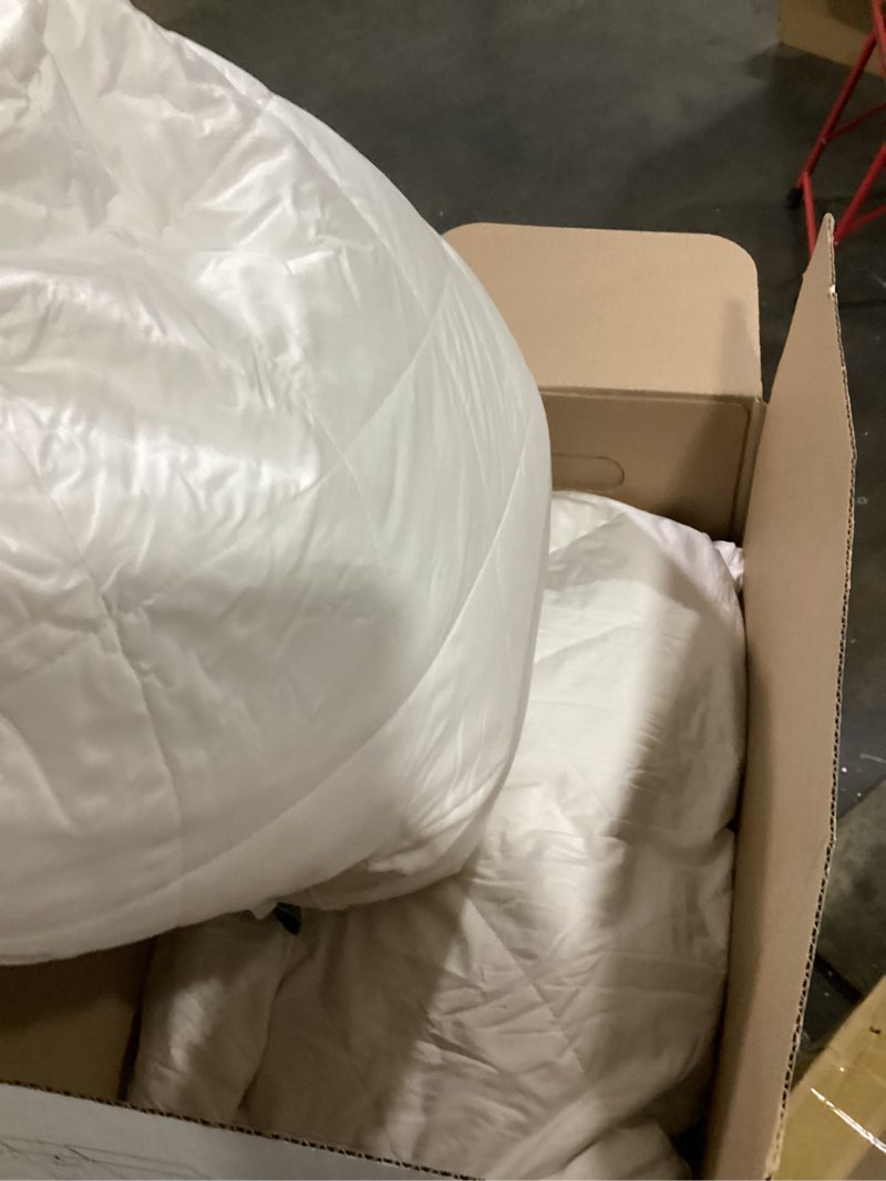 Condition photo showing New/Like New for three geese queen size white goose feather pillows set of 2 - soft 100% cotton 600 thread count, medium firm,soft support for side, back, and stomach sleepers - oeko-tex certified