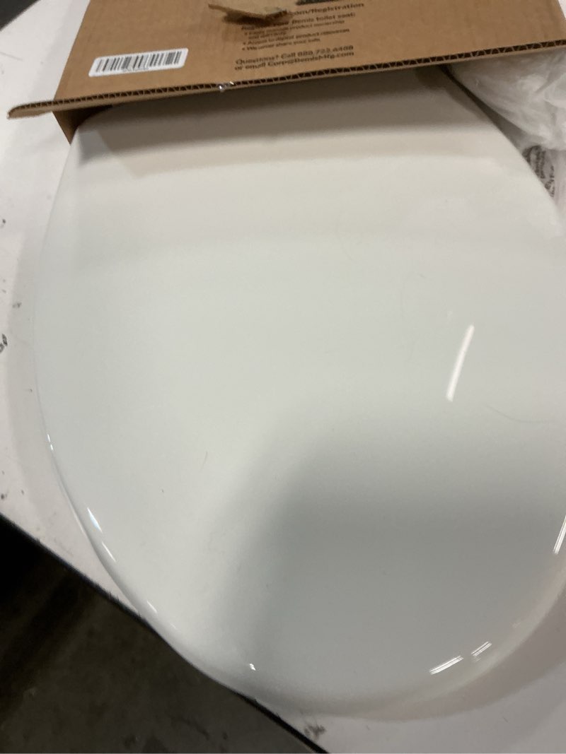 Condition photo showing As Is for mayfair little2big? elongated plastic toilet seat in white with sta-tite? seat fastening system? and whisper•close? hinge