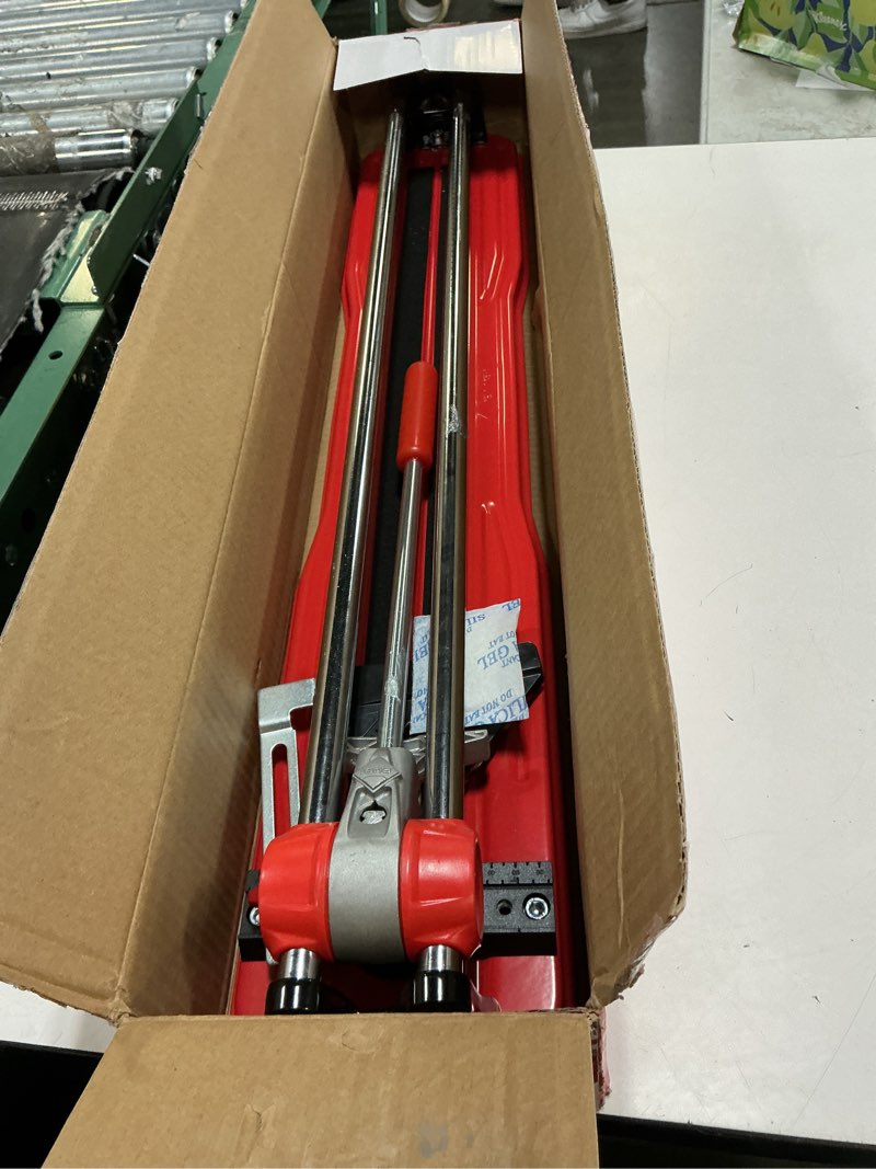 Condition photo showing As Is for rubi practic 61 plus-24 in. tile cutter with tungsten carbide blade and roller guide