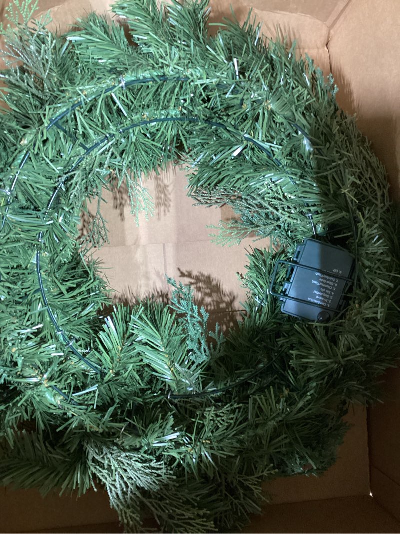 Condition photo showing item condition for Christmas Wreath Pre-lit 24 inch with 50 Led & Cupressus Tips, Battery Operated Artificial Christmas Wreaths for Front Door with Timer Lights, Wreath for Christmas Decoration Door Windows Wall Green Battery-G