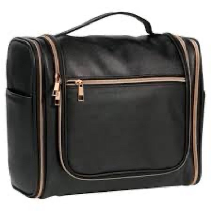 black cosmetic travel bag with gold-toned zippers