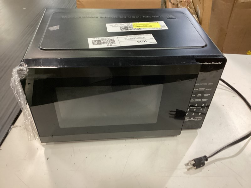 Condition photo showing As Is for hamilton beach 0.9 cu ft countertop microwave oven, 900 watts, black stainless steel