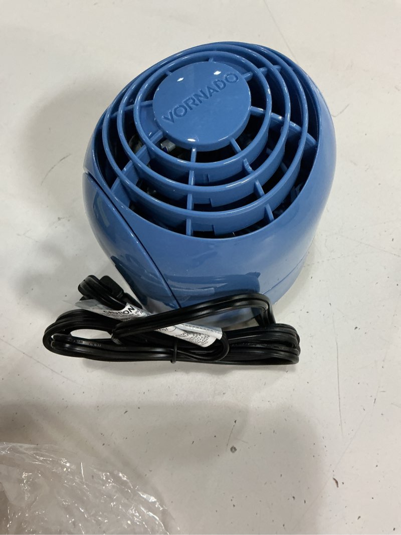 Condition photo showing As Is for vornado flippi v6 compact air circulator fan, 3.2" tabletop fan, adjustable head, 2 speeds, blue