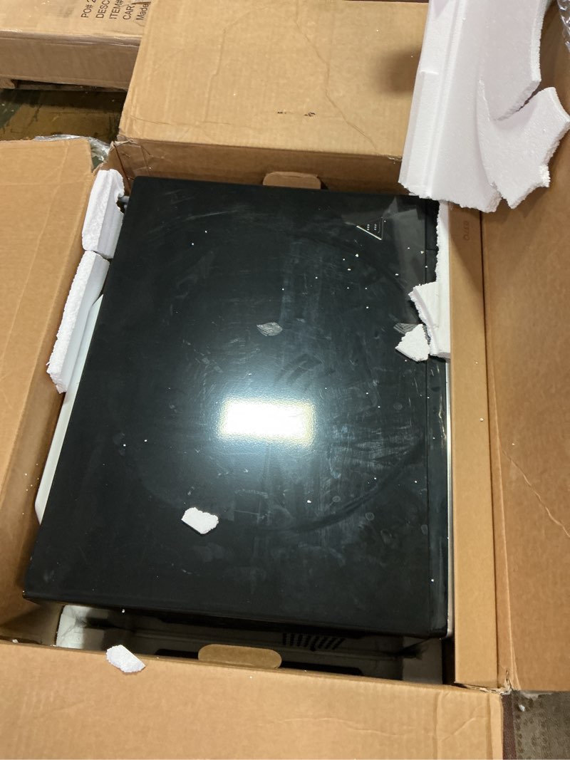 Condition photo showing As Is for GE Countertop Microwave Oven,1, 200-watt Capacity, 2.0 Cubic Ft., 8 Auto Setting Cooking Settings, Child-Lock Technology, Kitchen Essentials for the Countertop, Dorm Room or Apartment, Stainless Steel 2.0 Cu.Ft. Stainless Steel