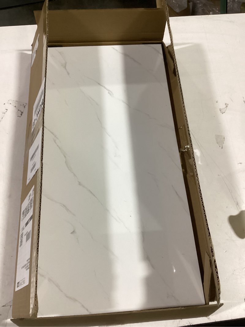 Condition photo showing New/Like New for Haimin Wall Panels Peel and Stick 10 Pieces 23.6x11.8in (19.4 Sq. Ft. Coverage) Lightweight Backsplash Marble Look Tile (not Real Marble) Ideal for Kitchen Bathrooms Living Rooms Bedrooms (White-LYB)