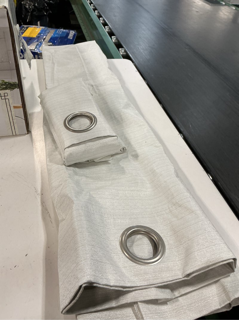 Condition photo showing Good Condition for sun zero 2-pack arlo textured thermal insulated grommet curtain panel pair  40 x63   pearl white