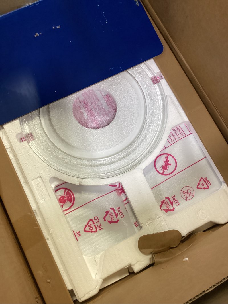 Condition photo showing New/Like New for GE® 1.4 Cu. Ft. Countertop Microwave Oven 1.4 Cu.Ft. White