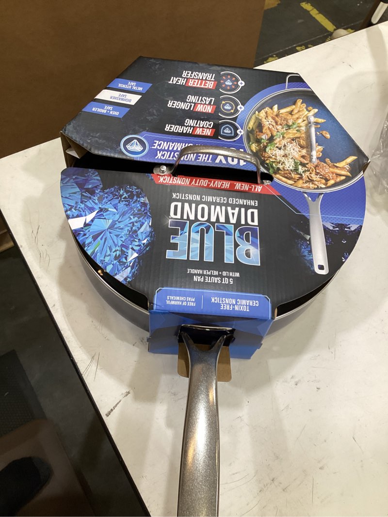 Condition photo showing New/Like New for blue diamond 5qt saute pan with lid, non toxic pfas-free diamond ceramic nonstick, dishwasher & oven safe, metal utensil safe, deep jumbo cooker skillet with helper handle, glass lid, blue blue 5 quart saute pan with lid