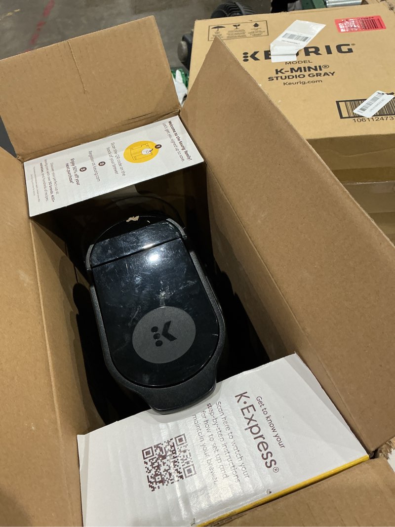 Condition photo showing As Is for keurig k-express single serve k-cup pod coffee maker, 3 brew sizes, strong button feature, 42oz removable reservoir, black
