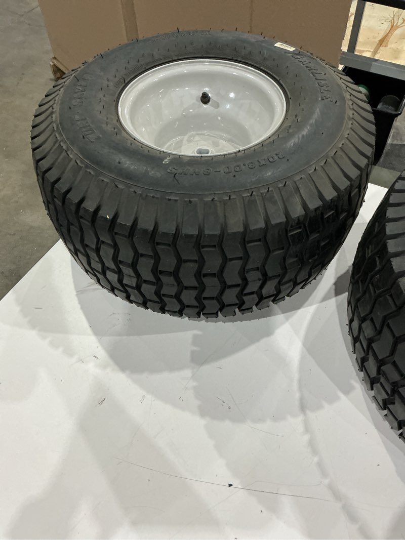 Condition photo showing New/Like New for 20 in. x 8 in. rear tractor wheel for troy-bilt cub cadet and craftsman lawn and garden tractors