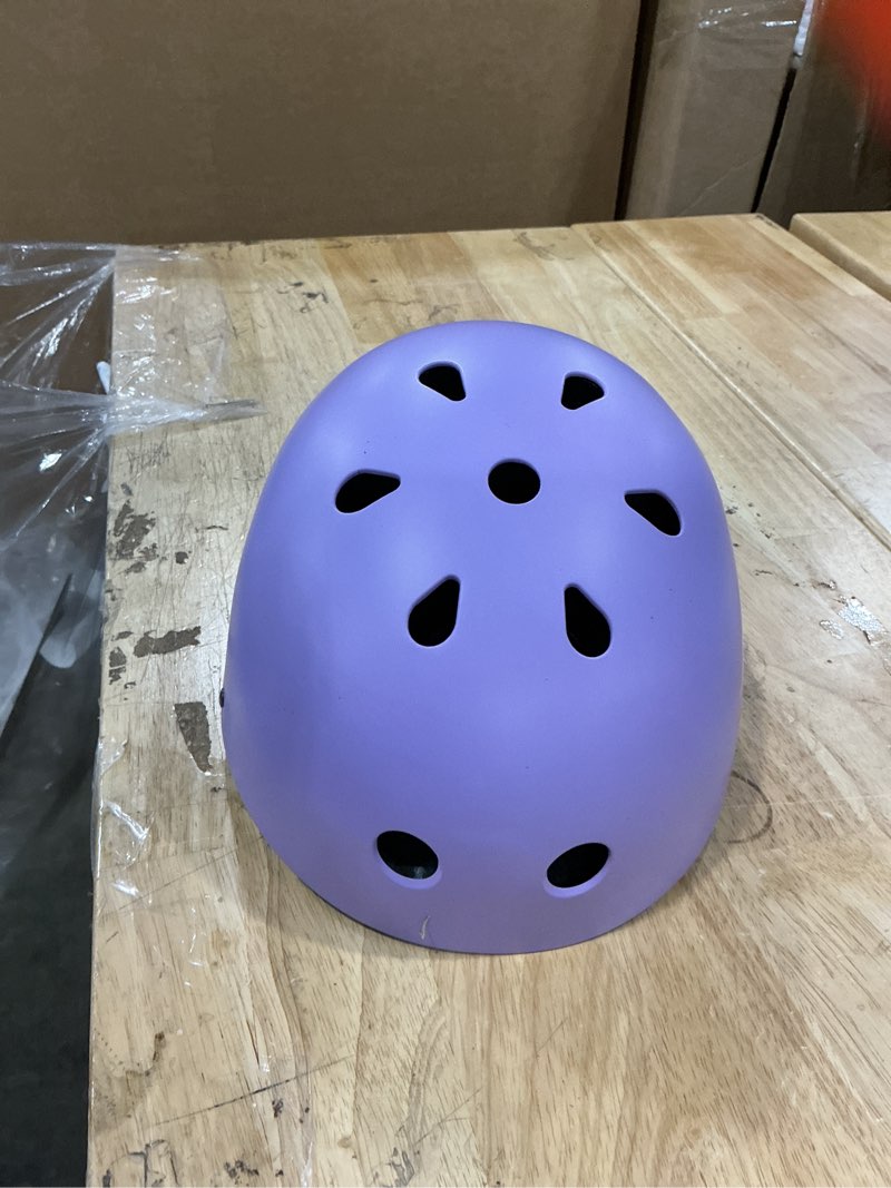 Condition photo showing New/Like New for kids bike helmet, adjustable and multi-sport, from toddler to youth, 3 sizes pale lavender medium: 21.3" - 22.4"