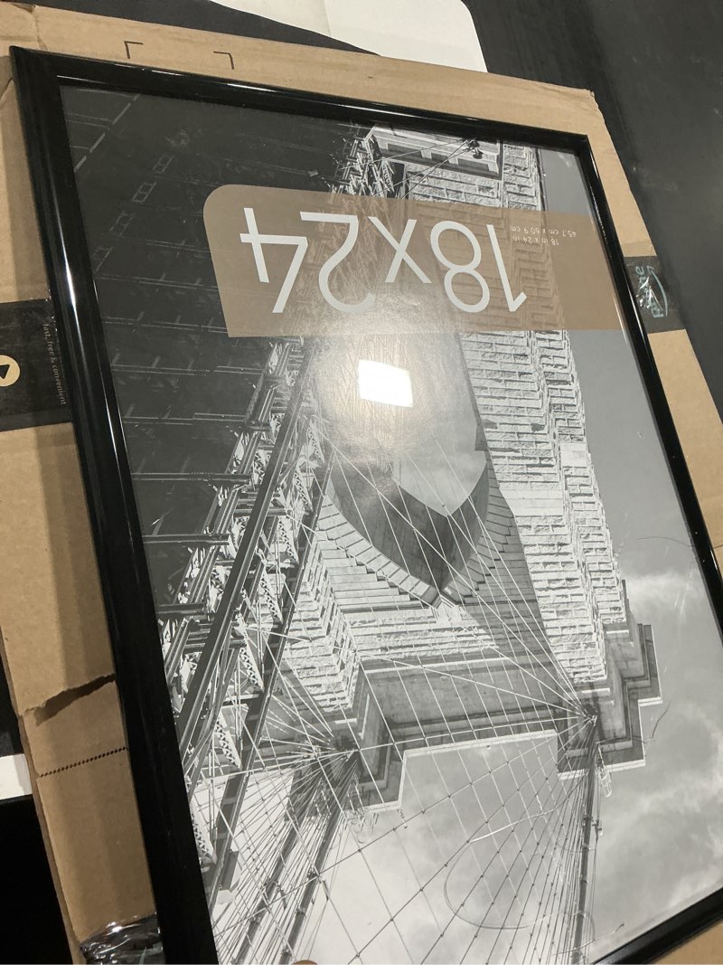 Condition photo showing item condition for MCS Trendsetter 18x24 Poster Frame Black High-Gloss, Vertical & Horizontal Wall Hanging Large Picture Frame for Photos, Posters & Art Prints (1-Pack) 1-Pack 18x24