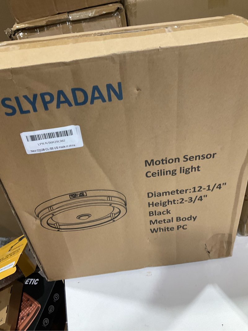 Condition photo showing New/Like New for outdoor motion sensor flush mount led light, 12" dusk to dawn porch modern black exterior light, ceiling light fixture for farmhouse garage entry black warm white 1 pack