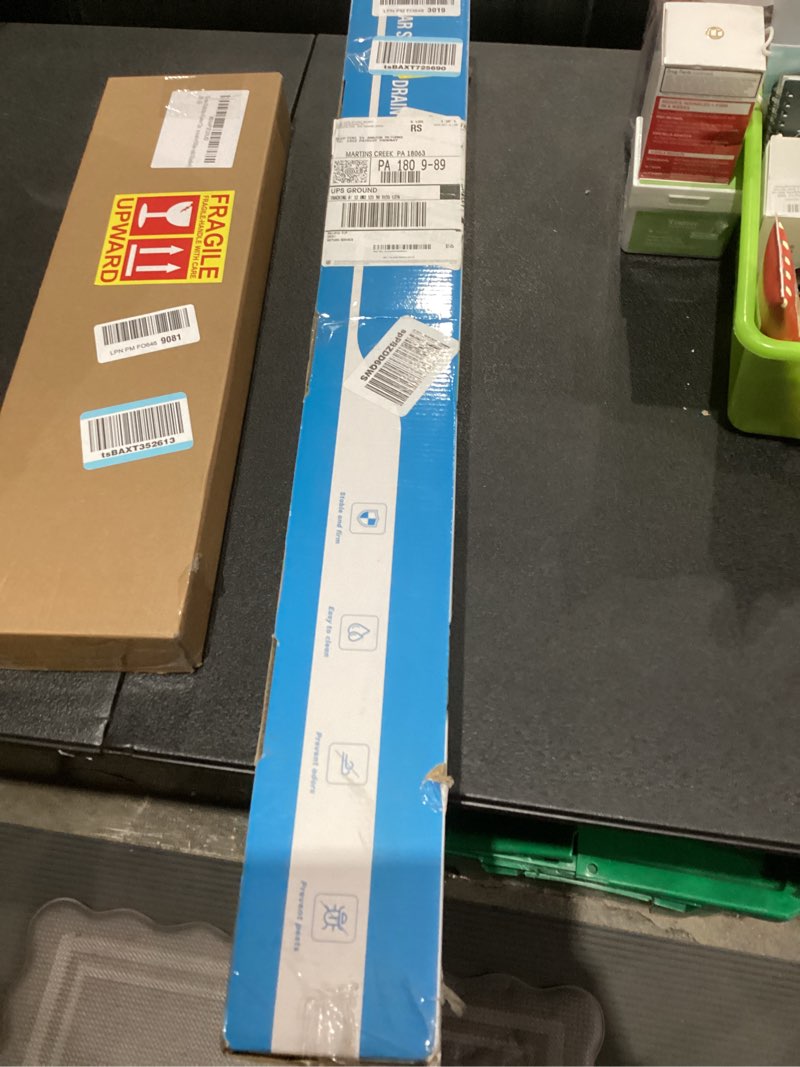 Condition photo showing As Is for SaniteModar Linear Shower Drain, Linear Drain 32 inch with Removable Square Hole Panel, Brushed 304 Stainless Steel Shower Floor Drain with Adjustable Feet and Hair Catcher Stainless Steel 32 inch